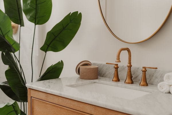 Modern bathroom sink with brass faucet